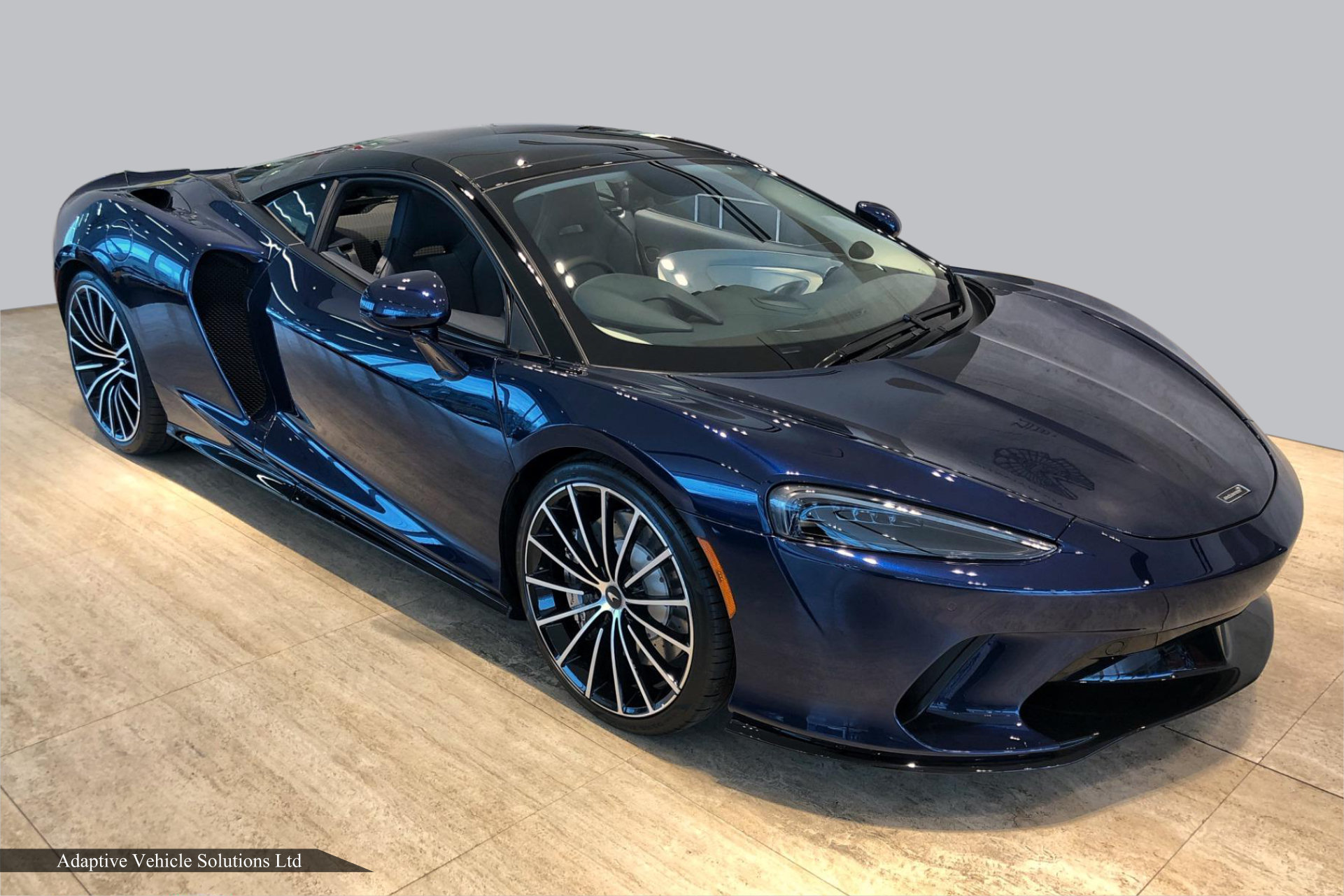 Namaka blue McLaren GT Coupe off side front view