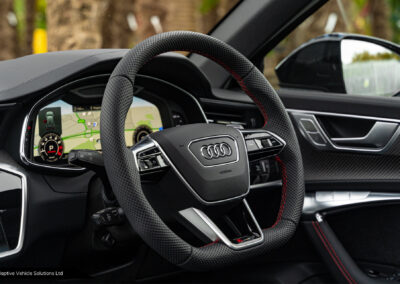 Audi RS6 Vorsprung Mythos Black steering wheel close up