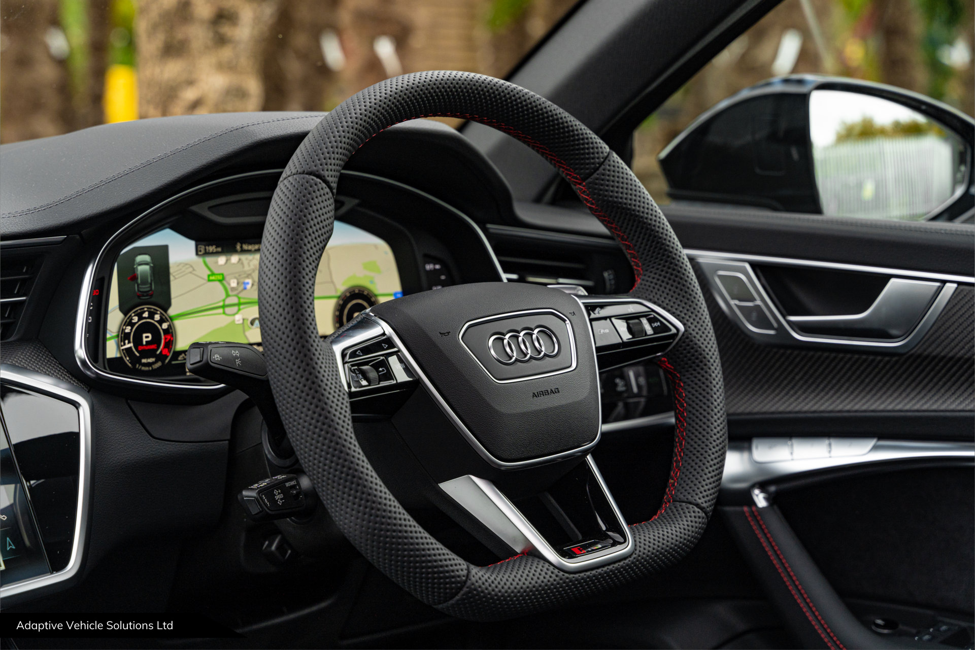 Audi RS6 Vorsprung Mythos Black steering wheel close up