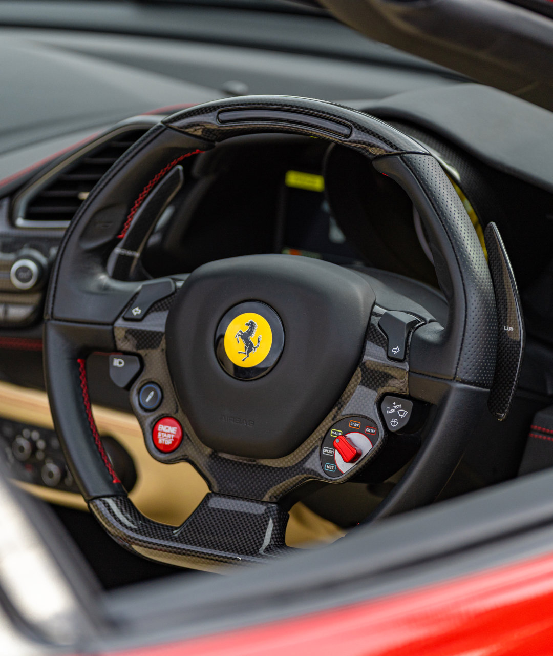 2019 Ferrari 488 Spider GTS Rosso Crema portrait steering wheel
