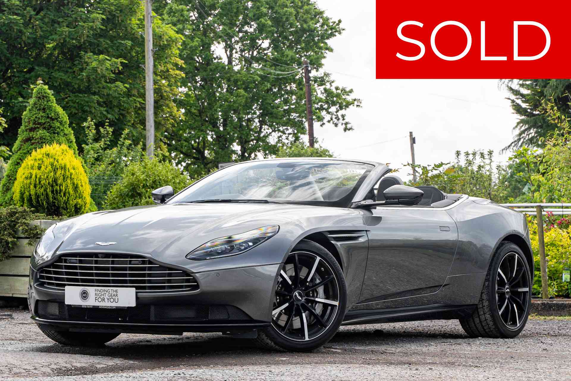 2023 72 Aston Martin DB11 Volante Magnetic Grey near side front youtube video roof down