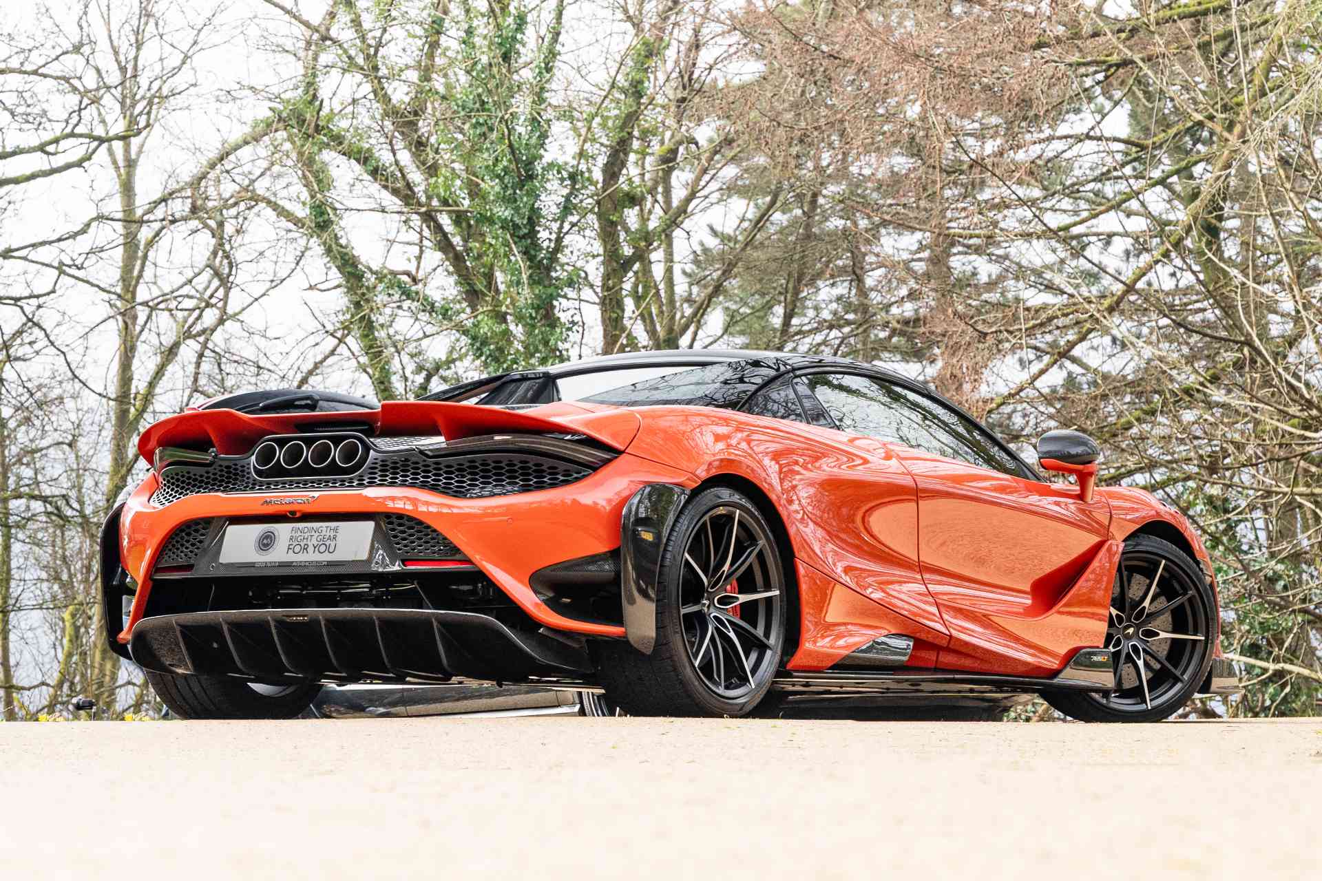 McLaren 765LT Spider Sourced Off side rear view of a volcano orange McLaren 765LT Spider sourced for client